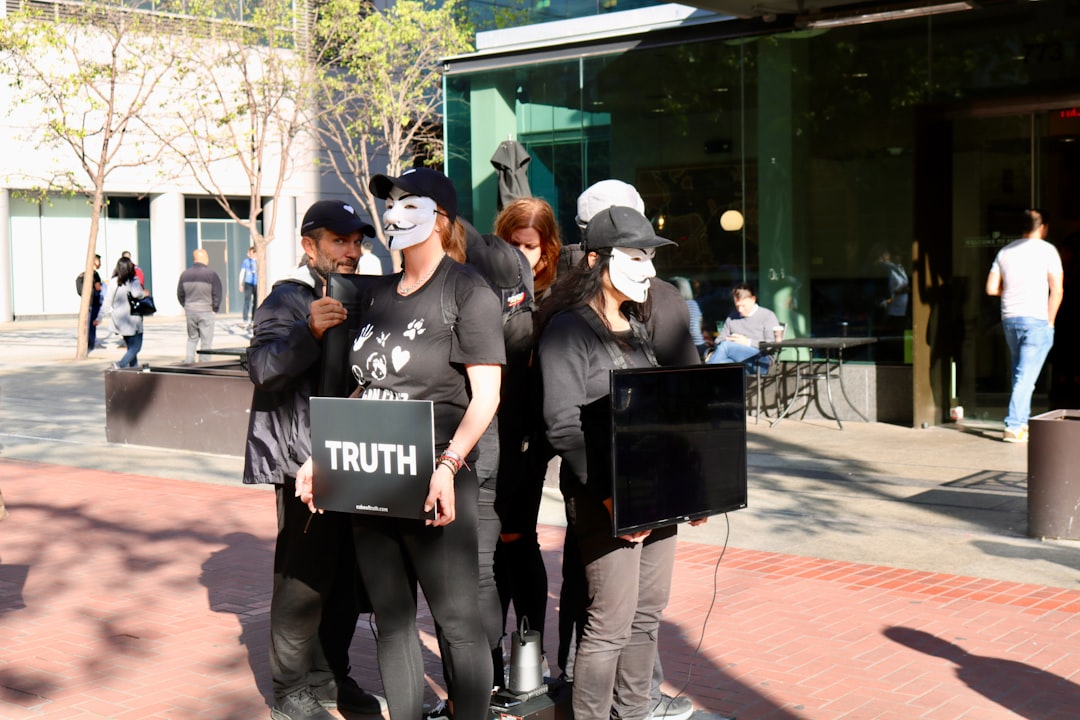 Group holds signs with 